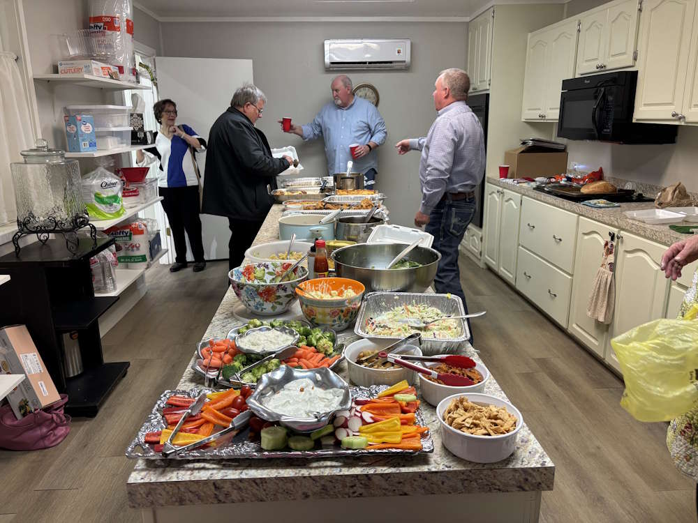 Patrick helping with the food